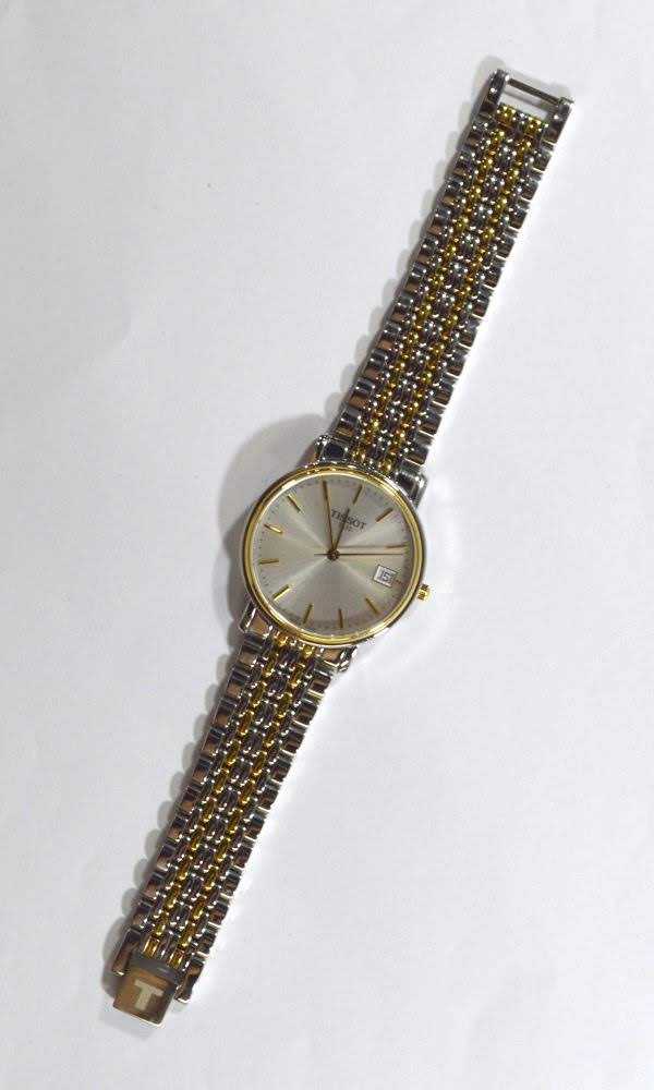 Rel gio Tissot 1853 a o e dourado sem uso com extens