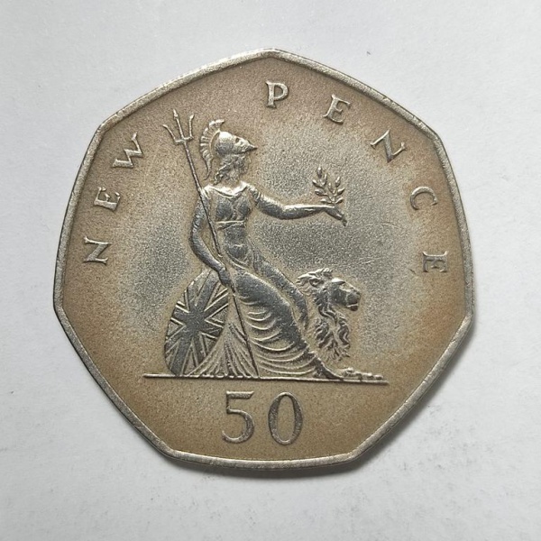Arte . Duas moedas do Reino Unido de 10 Pence datadas de 1969, foto 8