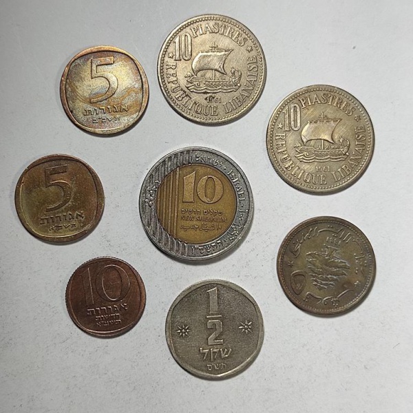 Arte . Duas moedas sendo: uma do mandato britânico da palestin foto 6