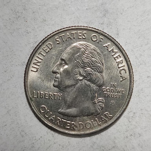 Arte . moeda americana de 25 centavos de dólar, datada de 1995 foto 1