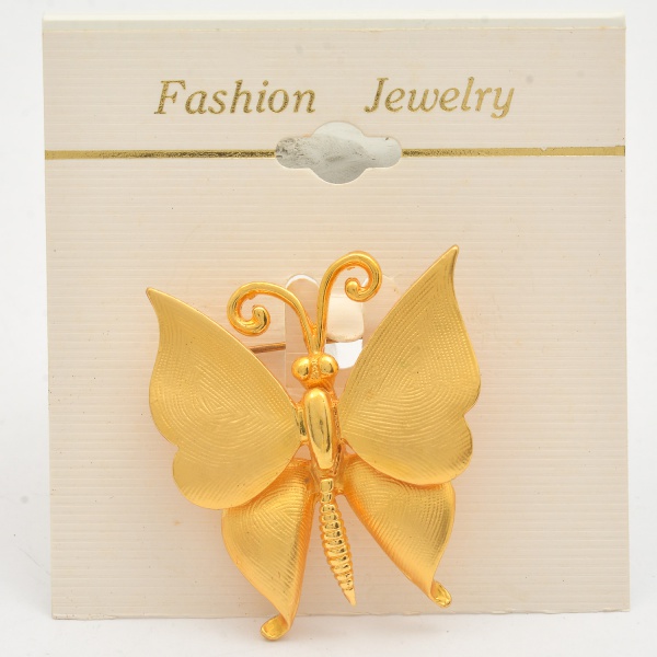 Arte . Broche de metal amarelo no formato de flor e esmalte na foto 4