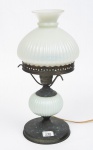 Antigo Lampião de mesa estilo art nouveau, em metal patinado, cúpula de época em vidro opalinado branco leitoso, adaptado p/ abatjour, alt. 35cm. (marcas do tempo).