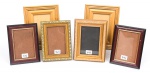 Três pares de porta retratos, em madeira dourado e patinado, total 06 peças, med. 23 x 17cm e 20 x 16cm.