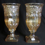 BOHEMIA - Par de grandes vasos estilo Luiz XVI, em grosso cristal "dito de fogo" lapidado ao gosto neo clássico em gomos e carreaux, med. 16 x 33cm.