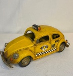 Colecionismo - Replica de Yellow Taxi NY em Ferro - Carro em estilo artesanal, em ferro; possui marcas do tempo. Medidas: 10 cm de largura x 8 cm de altura.
