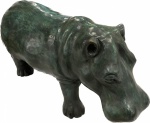Escultura em bronze patinado representando "Hipopótamo ". Med. 50 X 110 cm.
