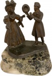 Grupo escultórico em bronze representando " Cena Galante", base em mármore. Med. total 17 X 14 cm.