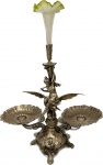 W.M.F-Maravilhoso centro de mesa em metal espessurado a prata representando figura feminina com Cornucópia sobre àguia e floreira em murano peça marcada. Med. 70 X 55 cm.
