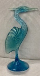 ABRAHAN PALATINK - Escultura em poliester na cor azul representando Pássaro. Med. 32 cm.