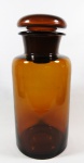 Antigo vidro de farmácia na cor âmbar, formato cilíndrico, borda revirada. med: 28 cm
