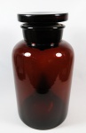 Antigo vidro de farmácia na cor âmbar, formato cilíndrico, borda revirada. med: 34 cm
